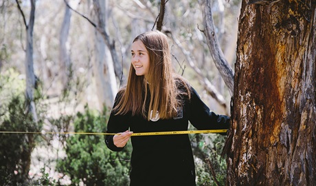 Student measuring a sample quadrant during an excursion activity in Kosciuszko National Park. Photo: Remy Brand &copy; DPE