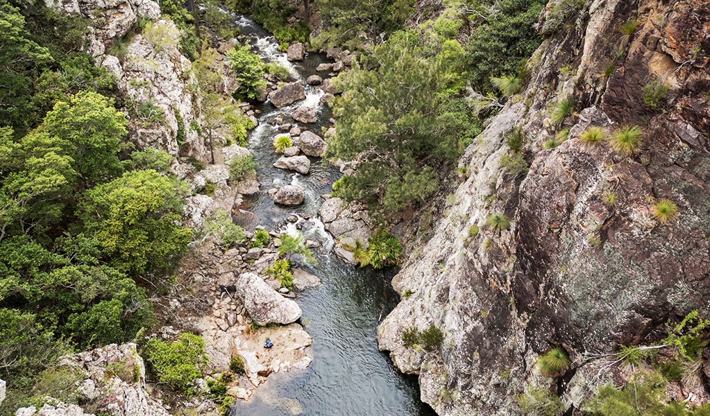 Gorge country means dramatic cliffs, ridges and plenty of water on The Green Gully Track. Credit: David Waugh &copy; DCCEEW